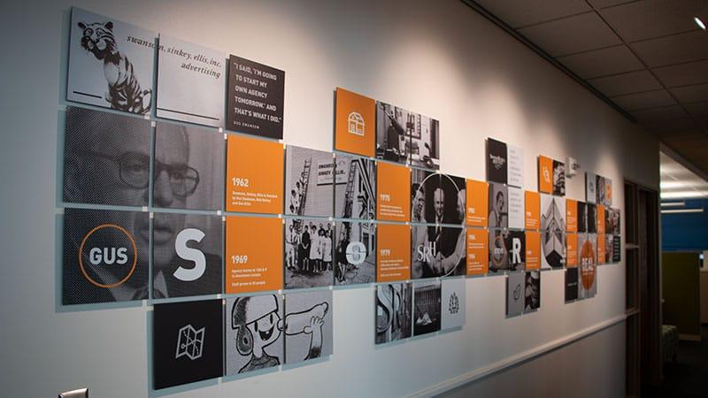 Wall art showing the history of Swanson Russell