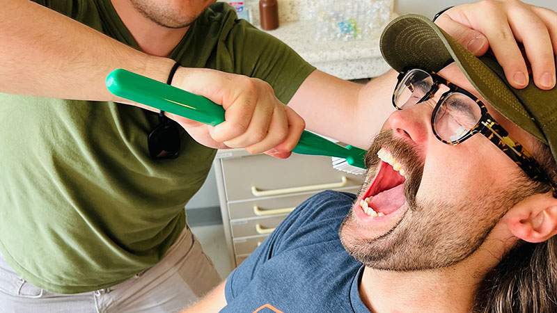 Two employees joking around during a team outing