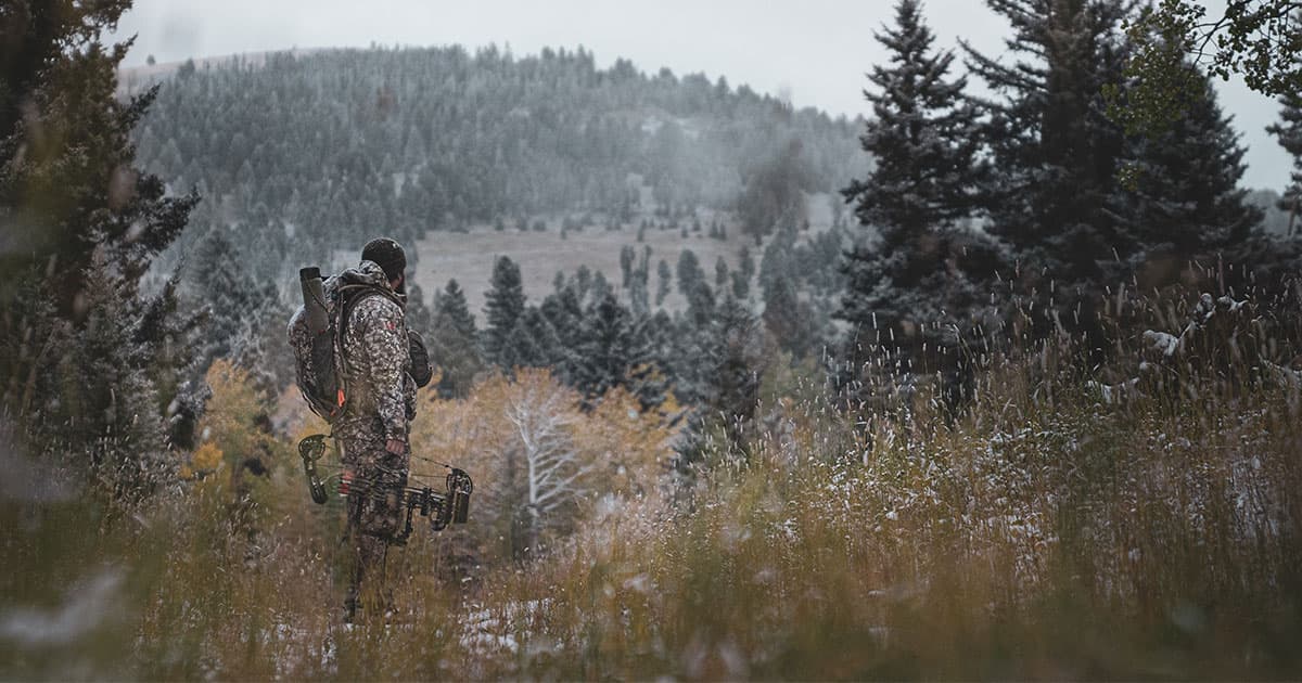 Man in Camo Hunting Gear in the Mountains