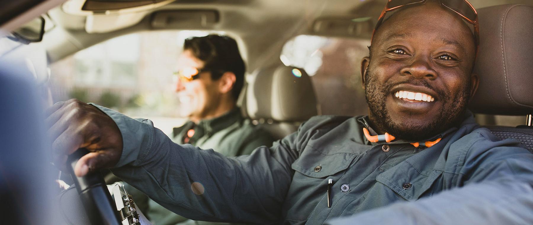 Two men in a vehicle