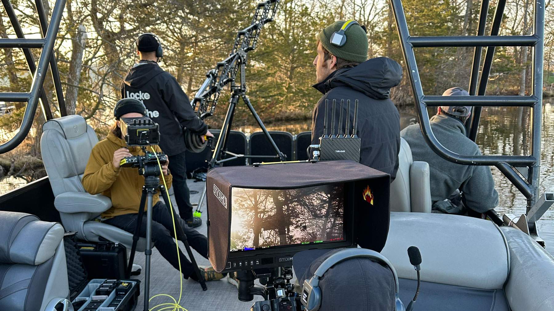 Behind the scenes of photographers shooting footage for a client.